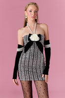 Nur Karaata Vivienne Rose mini dress featuring floral print, sleeveless design, and fitted silhouette on a mannequin.