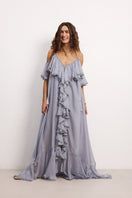 OvertheSea San Francisco gray-blue maxi dress displayed on a hanger, showcasing its flowing fabric and elegant design.