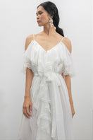 White OVERTHESEA SAN FRANCISCO maxi dress displayed on a hanger, lightweight fabric with a flowing silhouette and subtle detailing.