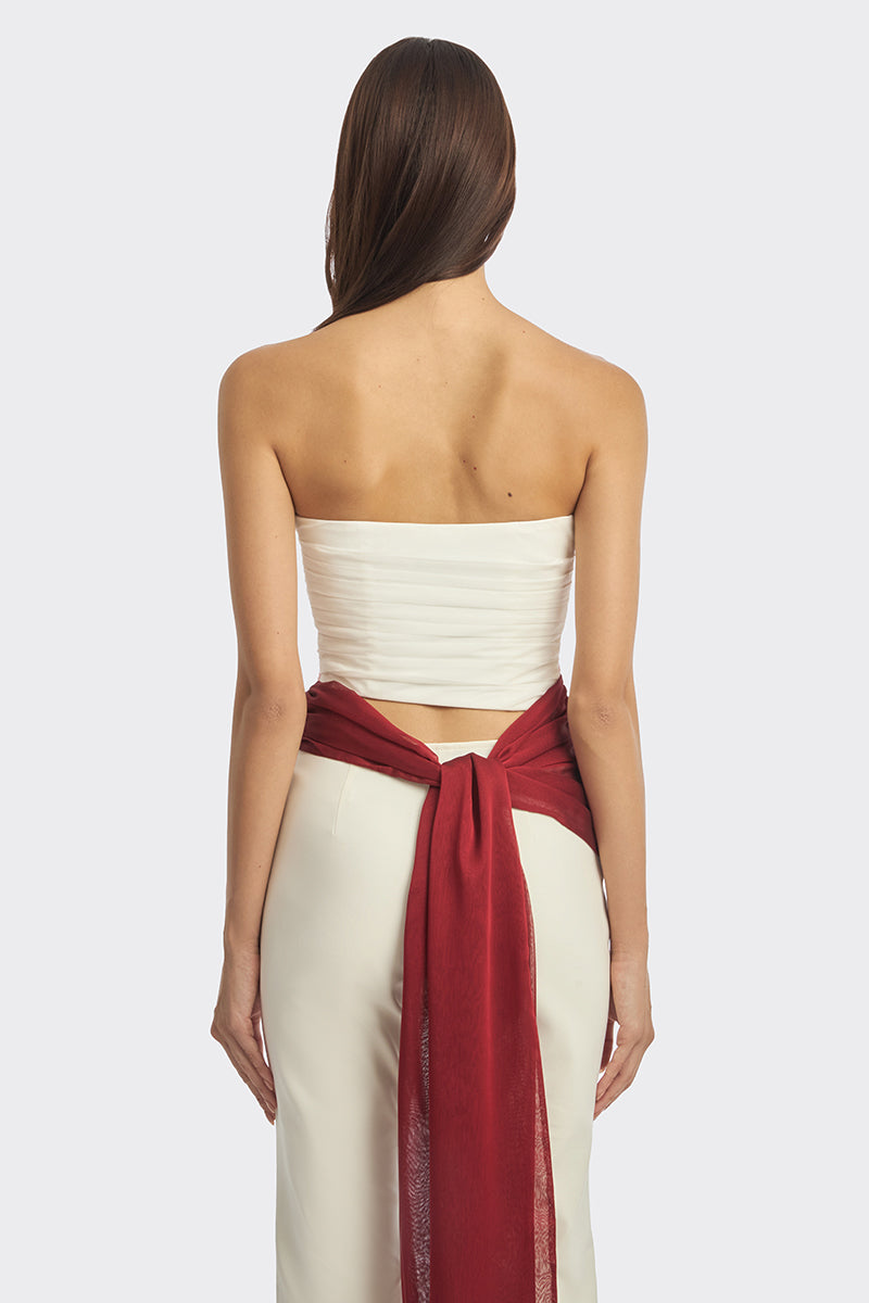 Three-tone burgundy bustier top by Stolen Stores, featuring a stylish fitted design with intricate details.