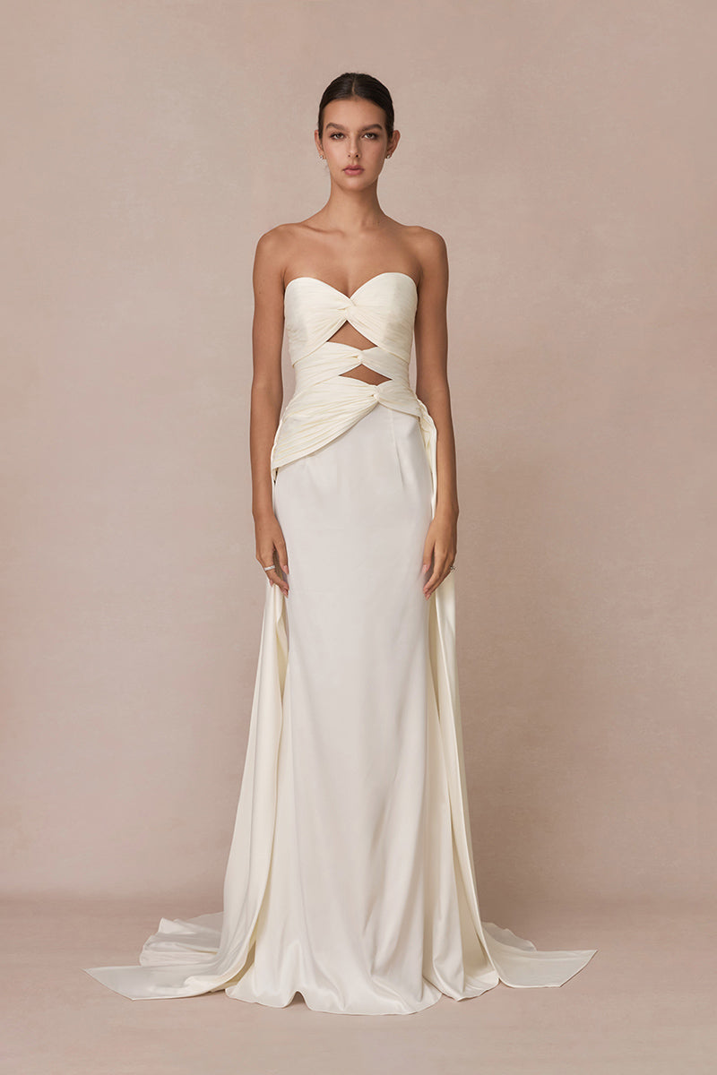 White 3-carat bustier top from Stolen Stores, stylish and fitted, with detailed bust design and sleek fabric for a modern look.