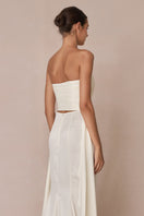 White 3-carat bustier top by Stolen Stores, featuring a fitted design and stylish details, ideal for fashion-forward outfits.
