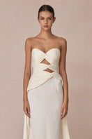 White 3-carat bustier top by Stolen Stores, showcasing a fitted design with structured bust and stylish details.