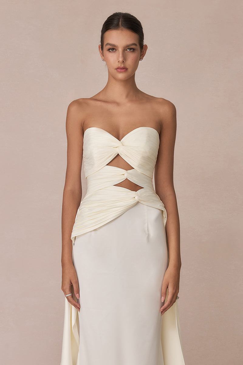 White 3-carat bustier top by Stolen Stores, showcasing a fitted design with structured bust and stylish details.