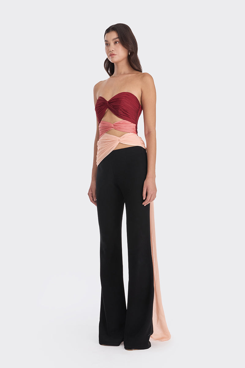 Three-tone red and peach bustier top from Stolen Stores featuring warm tone details and stylish design.