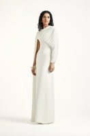 Elegant off-white ARIENNE gown by Deme By Gabriella, flowing fabric with intricate details for formal occasions.