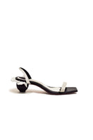 Christin Wu Penny two-tone sandals with strappy design and cushioned sole, ideal for casual summer wear