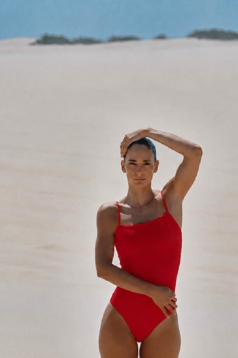 Verdelimon Sumatra one-piece swimsuit in cherry, featuring a vibrant red color and sleek design, suitable for swimming and beachwear.