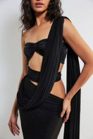 Deme By Gabriella Inga black cut-out maxi dress with stylish side cut-outs and flowing fabric, perfect for elegant occasions.