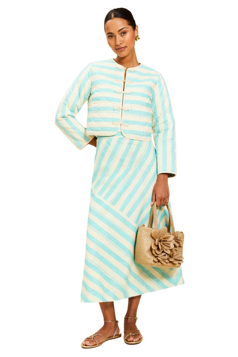 Mestiza New York Santiago convertible midi skirt in Aegean Blooms with floral pattern, flowing fabric, and adjustable length design.