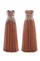 HACCHIC COUTURE Aurora embellished gown in cinnamon rose with intricate beadwork and flowing fabric, elegant evening wear.