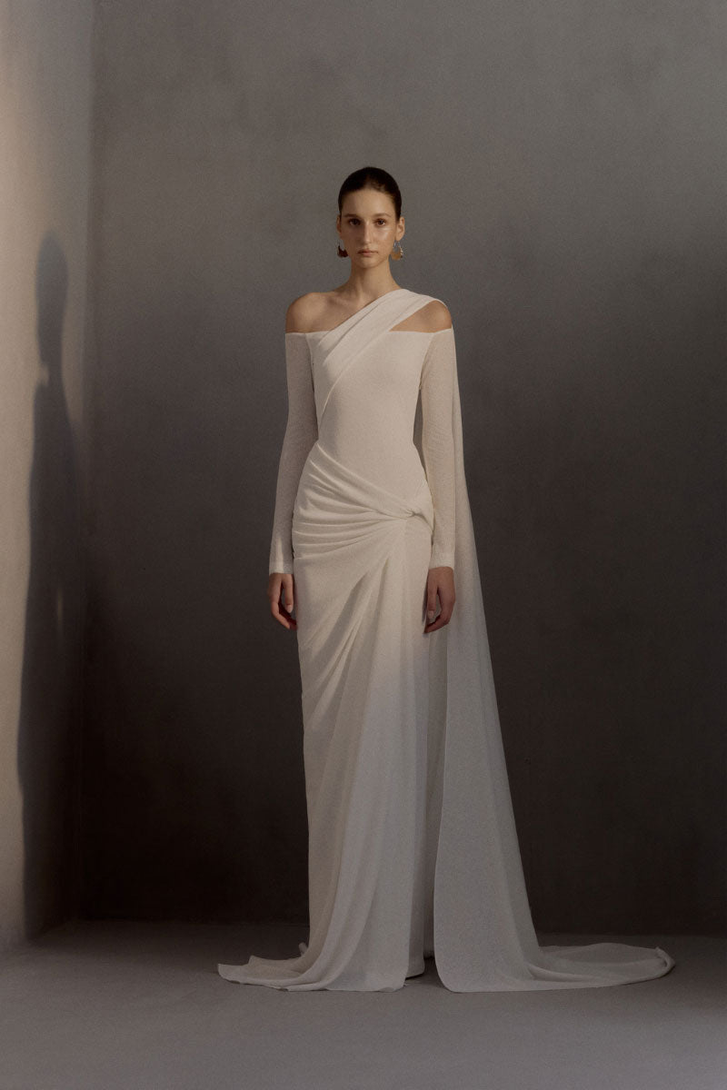 White Plan Narcotic Dress gown with elegant design, featuring flowing fabric and stylish details for formal occasions.