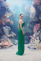 Emerald green Sirena Water Silk Taffeta gown by 21Six, featuring a flowing silhouette and elegant design.