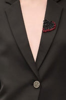 Black Kelly Taffeta Feather Suit co-ord set by 21Six featuring a feathered jacket and matching pants.