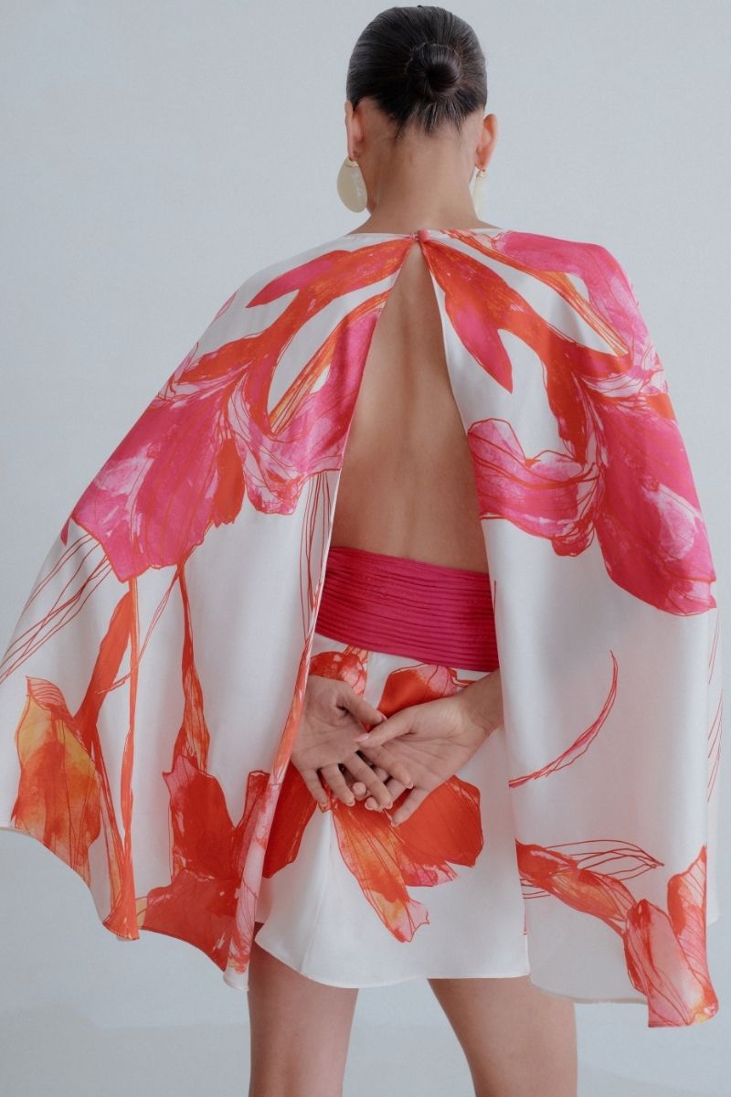 Sisters Amanda mini dress in ivory fuchsia featuring a stylish, fitted silhouette and vibrant color for a trendy look.