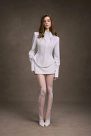 White cupped collar shirt by Keira Tong, shown with long sleeves and button-down front, casual and stylish for everyday wear.