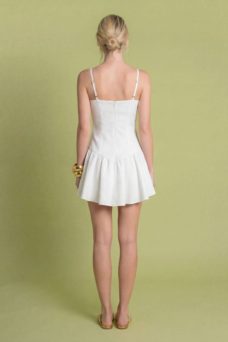 White Sunny Dress mini dress by Laura Escobar featuring a stylish, lightweight fabric and a flattering fit.