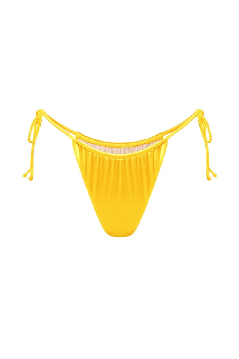 Yellow glossy bikini bottom from Suncillo VIRNA collection, featuring sleek fabric and a stylish fit for beachwear.
