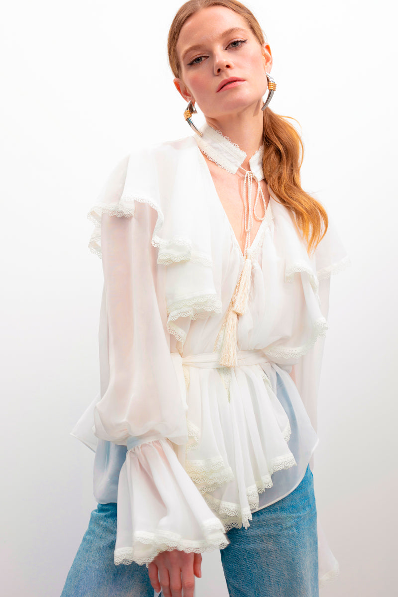 OvertheSea Ocean of Tenderness blouse in milky white, lightweight top with soft fabric and delicate design, displayed on a hanger.