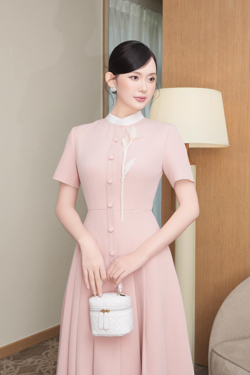 White Plan Cascara midi dress featuring a flowing fabric and elegant design, perfect for versatile stylish wear.