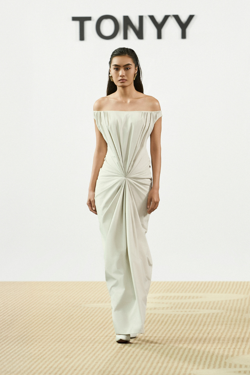 Ivory TONYY maxi dress with flowing fabric and sleeveless design, perfect for elegant summer or evening wear.