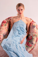 Sky blue AQUA maxi dress by OVERTHESEA featuring flowing fabric and a sleeveless design, perfect for warm weather.