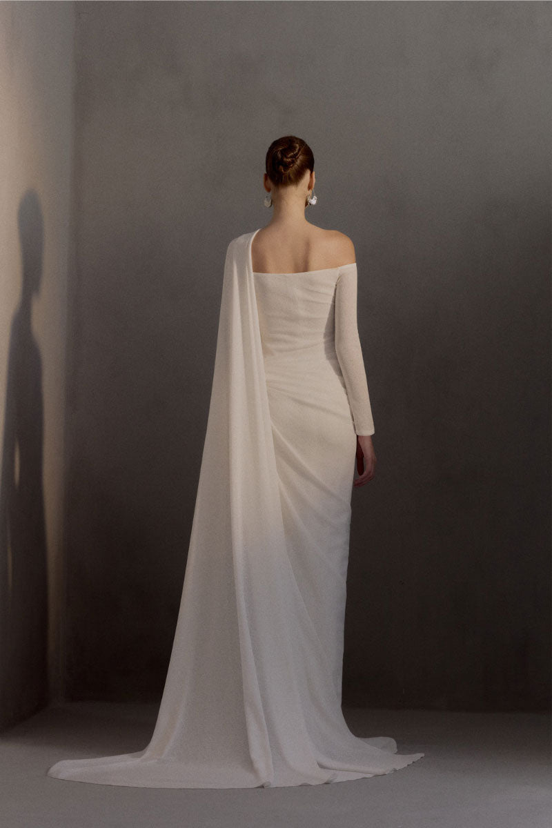 White Plan Narcotic Dress gown with intricate lace and flowing fabric, featuring long sleeves and elegant design.