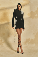 L'SCARLETT long-sleeve poly crepe mini dress with fitted silhouette and round neckline, shown on a model.