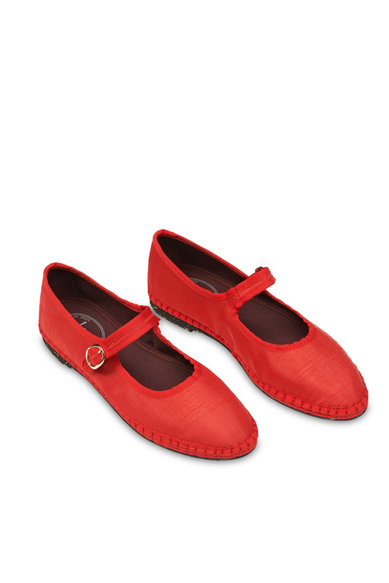 Flabelus Polly red flats with matching red piping, featuring a sleek design and comfortable slip-on style for everyday wear.
