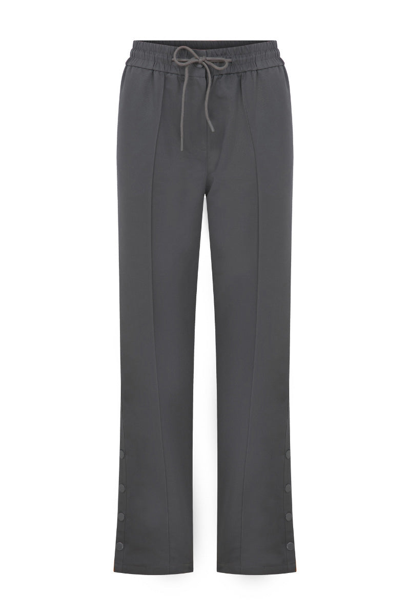 Gray ColoReve sweat pants with relaxed fit and elastic waistband, shown on a model. Comfortable casual pants for everyday wear.