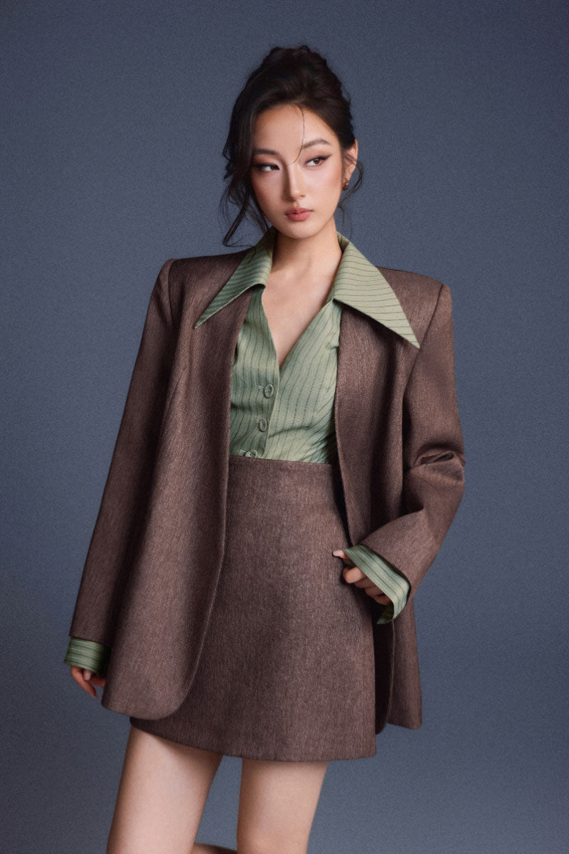 Keira Tong minimal fitted blazer in a tailored design, featuring a sleek lapel and structured fit for a modern professional look.