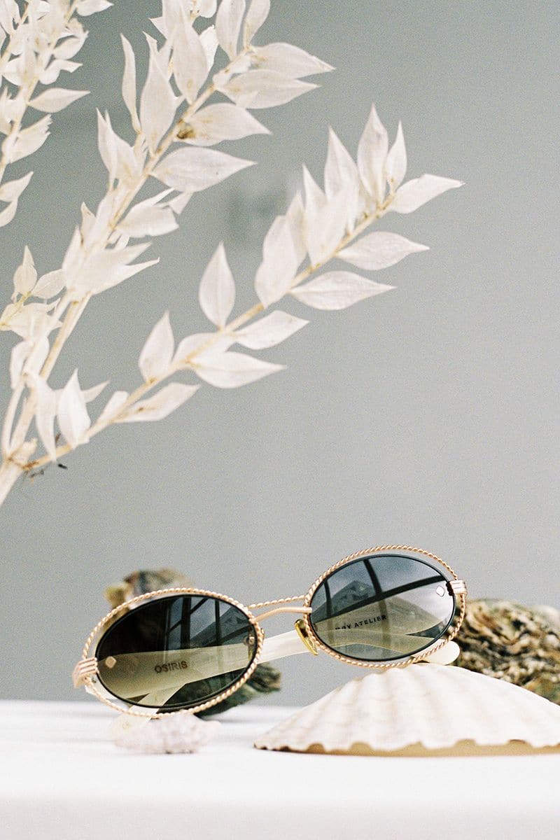 Moy Atelier Pearl Osiris sunglasses with round frames and pearl accents, stylish eyewear for a chic look.