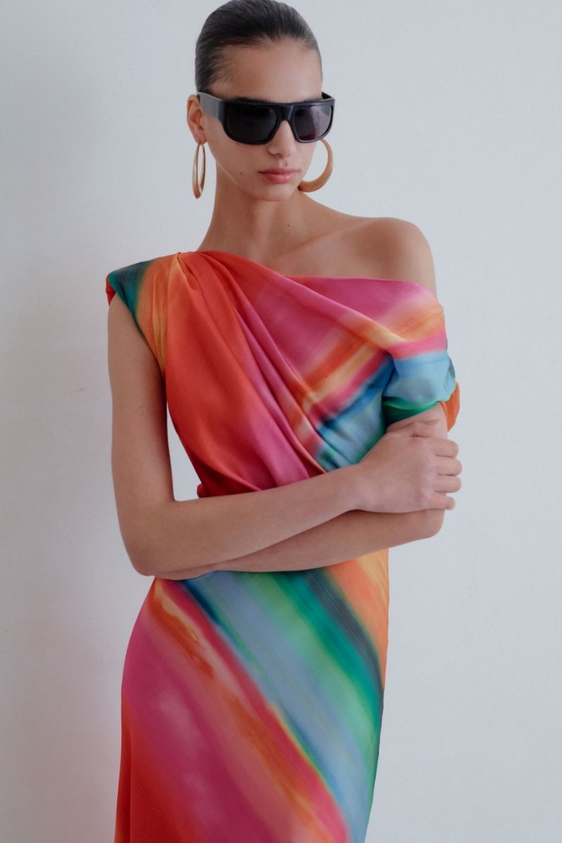 Sisters Nikki maxi dress in Sunset Serenade with flowing fabric and vibrant sunset-inspired pattern, perfect for summer wear.