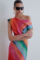 Sisters Nikki maxi dress in Sunset Serenade, flowing floral maxi dress with vibrant sunset-inspired colors, perfect for summer wear.