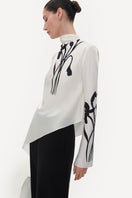 Elenareva ivory silk blouse with colorful floral print, long sleeves, and elegant design, perfect for stylish casual wear.