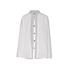Baobab Wayra shirt displayed on a hanger, featuring a lightweight fabric and casual style perfect for everyday wear.