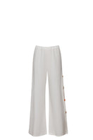 Baobab WAYRA pants in soft fabric with a relaxed fit, shown in a neutral color, featuring a comfortable waistband and stylish design.
