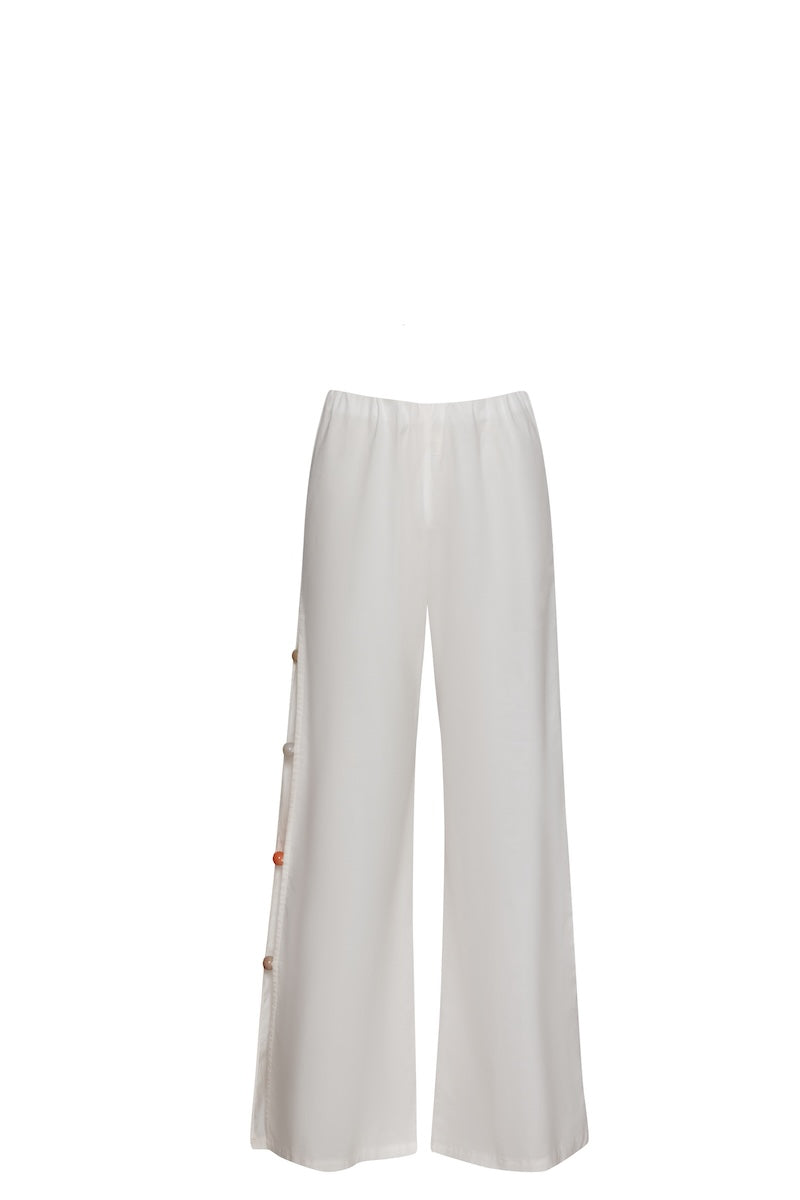Baobab WAYRA pants in a stylish design, shown in a natural fabric with a relaxed fit, perfect for casual wear.