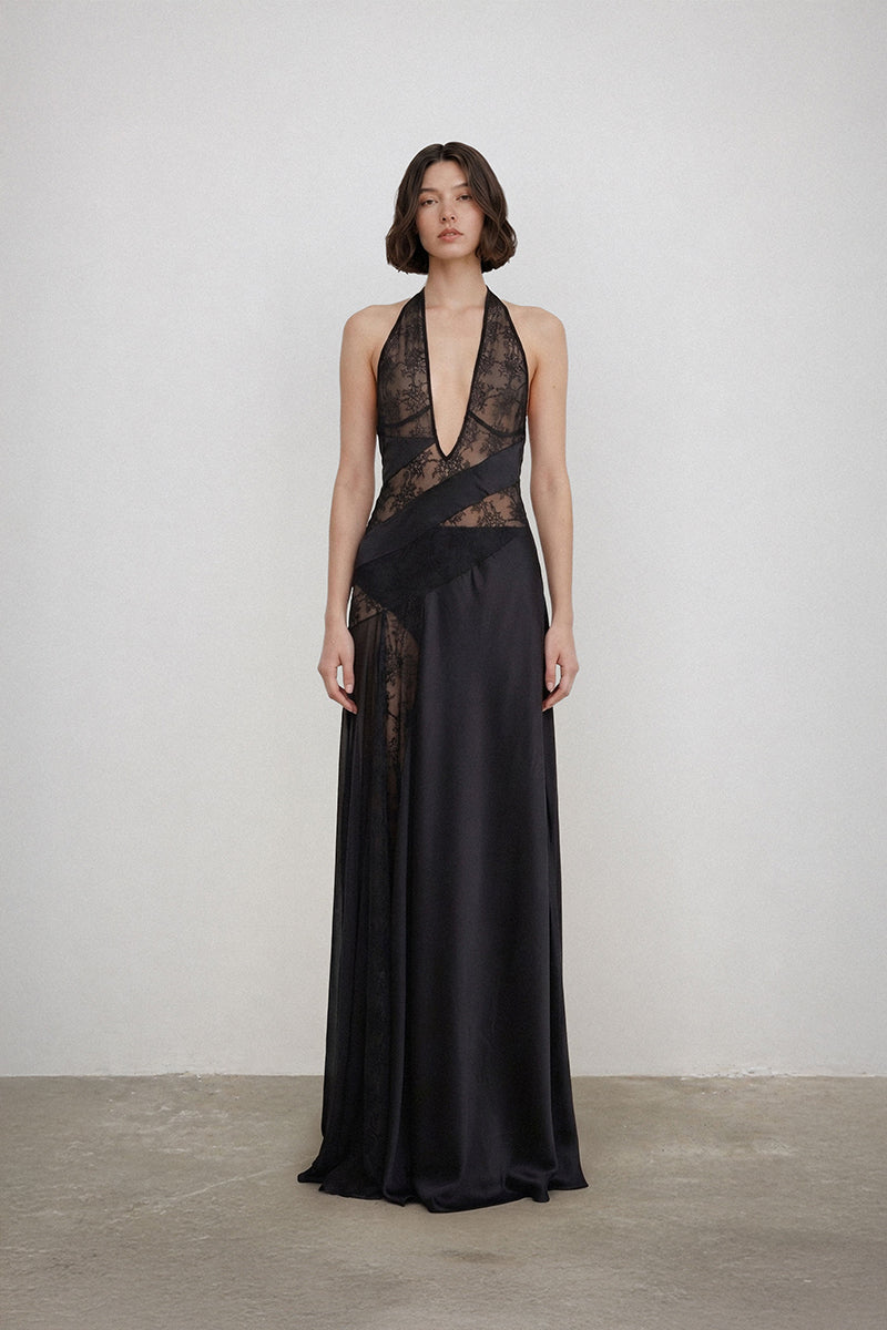 Deme By Gabriella Ruth gown, elegant evening dress with flowing fabric and intricate detailing, suitable for formal occasions.