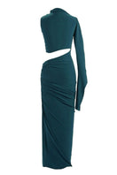 Aquarel Studio Gaia maxi dress with a flowing silhouette and vibrant floral pattern on lightweight fabric.