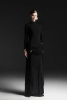 Black MIRÉA high neck floor-length gown by Maison Des Copains, shown with elegant draping and long sleeves.
