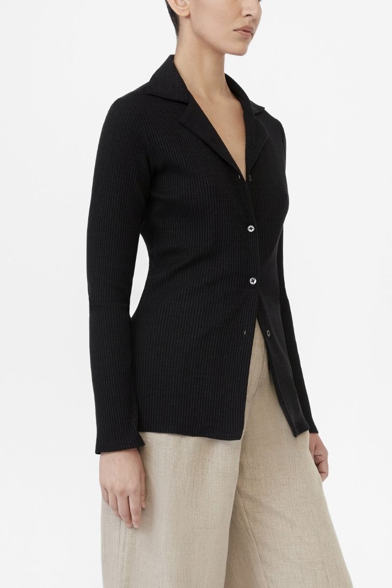 Dāl the Label modal rib knit collared cardigan with long sleeves and button closure, displayed on a neutral background.