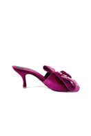 Christin Wu Raina Fuchsia Bow Heels featuring vibrant pink color and elegant bow detail on stylish high heels.