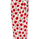 White Poppy pareo cover-up by Verdelimon featuring lightweight fabric and floral design, styled as a beach or poolside wrap.