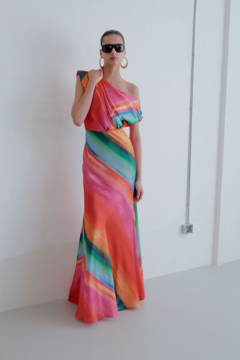 Sisters Nikki maxi dress in Sunset Serenade with flowing fabric and vibrant sunset-inspired colors, perfect for summer wear.
