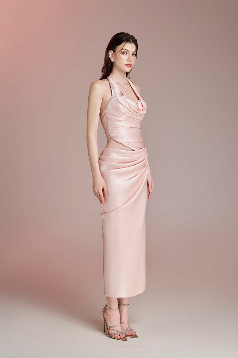 Do Long Ember Trail pink gown featuring a flowing, elegant design with soft fabric and subtle draping.
