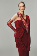 Elegant Margée Atelier EVA one-shoulder gown featuring flowing fabric and a sophisticated draped design for formal occasions.