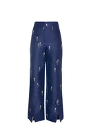 Estefania lovely navy tulip pants with a stylish, flowy design and tailored fit, shown on a model.
