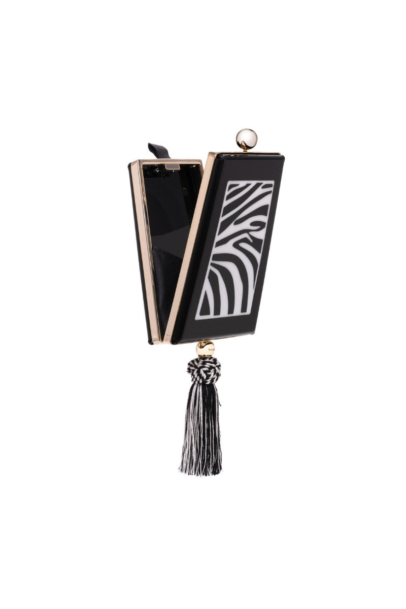 Waiwai Rio zebra print trapezio shoulder bag featuring bold black and white zebra pattern with a sleek design.
