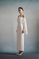White Plan Elara off-shoulder maxi dress featuring flowing fabric and a relaxed fit, perfect for summer occasions.